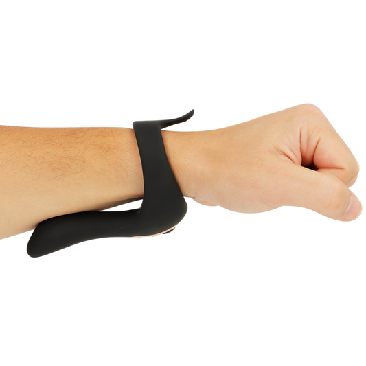 Black fitness tracker on a wrist against a white background