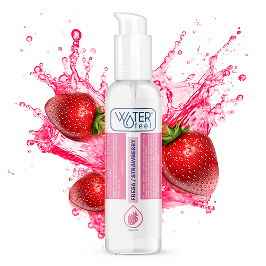 Bottle of 'Waterfeel' strawberry-flavored product with strawberries and pink liquid splashes on a white background