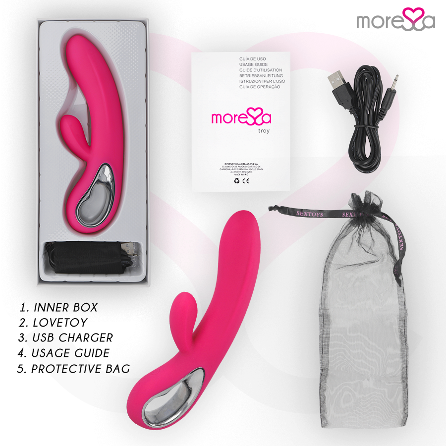 Pink toy with packaging, USB cable, and usage guide on a white background