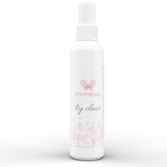 White spray bottle labeled 'toy clear' with a pink butterfly logo on a white background