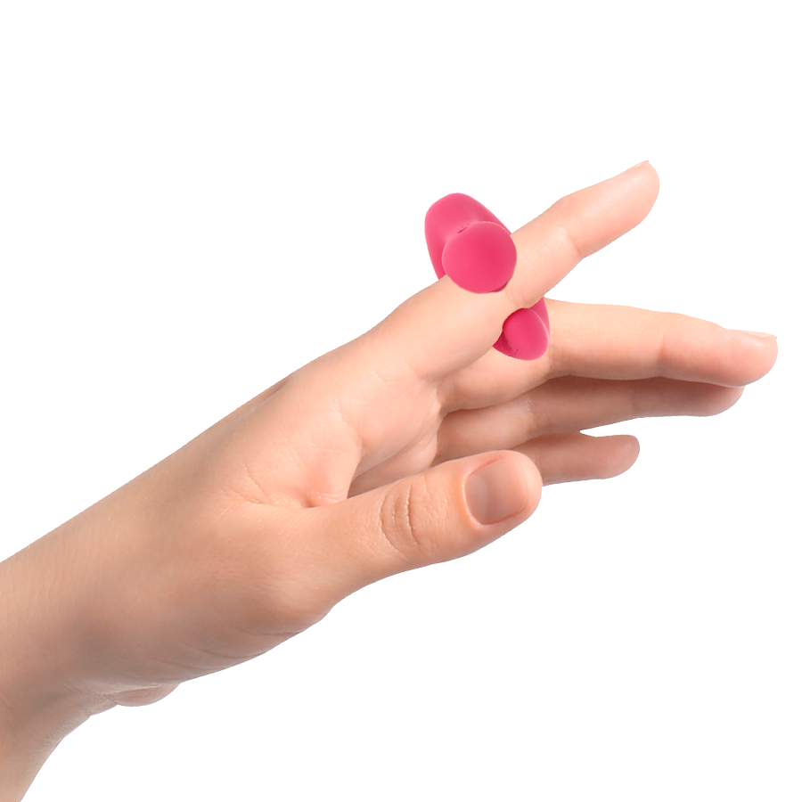 Hand wearing pink silicone finger sleeves on a white background