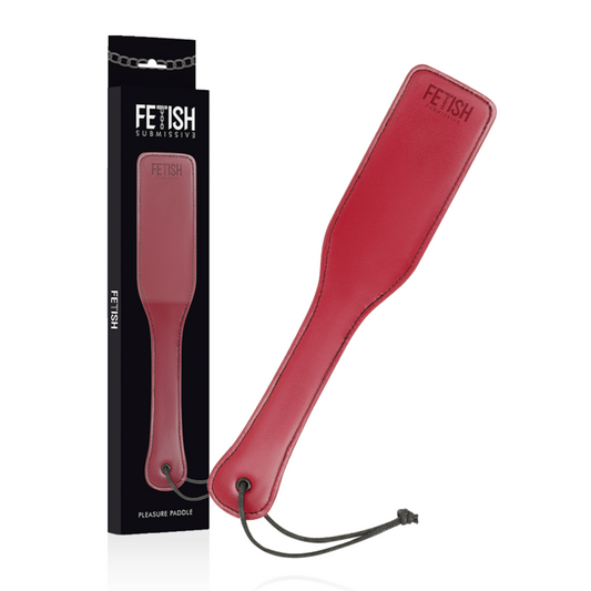 Red leather paddle with 'Fetish' branding and packaging on a white background