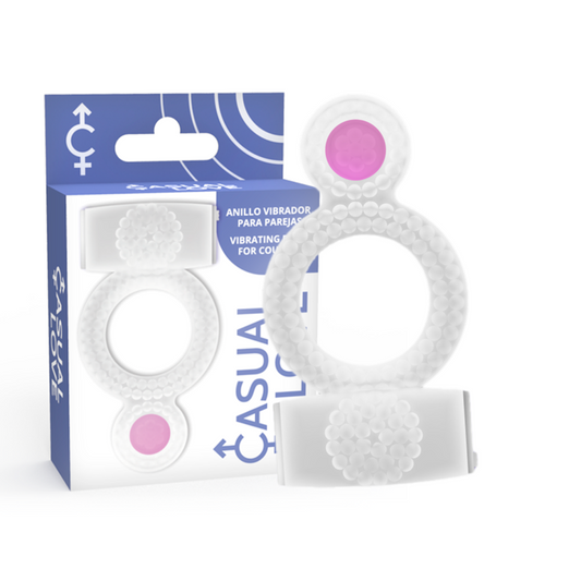 White ring with pink dot next to its packaging on a white background