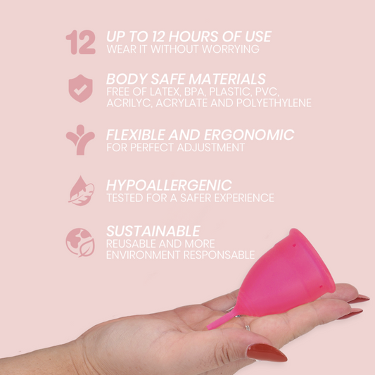 Pink menstrual cup held in a hand with features listed on a pink background