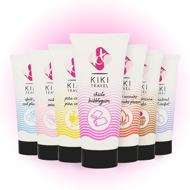 Set of KIKI Travel products with colorful labels on a pink background