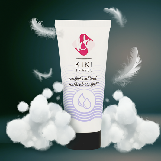 KIKI Travel tube with feathers and cotton on a dark background