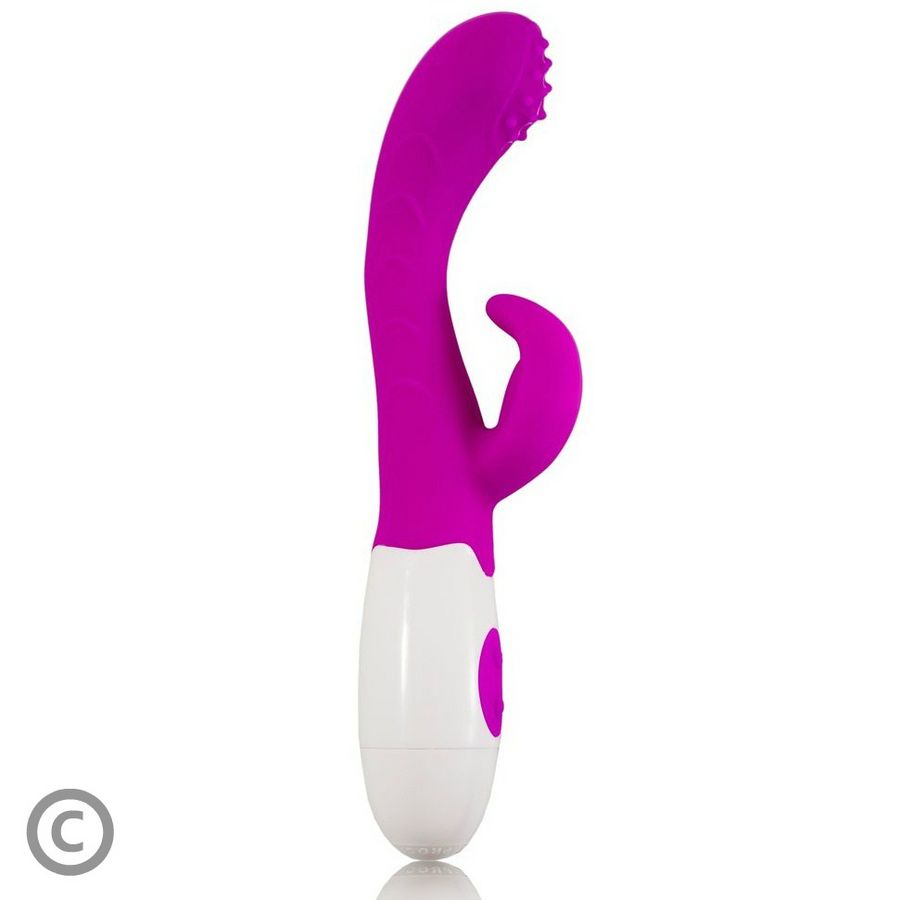 Purple and white dental floss holder on a white background