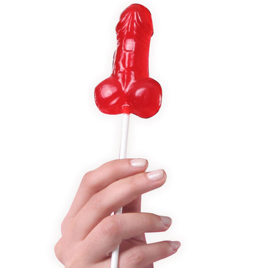 Red object shaped like a buttocks on a stick held by a hand against a white background
