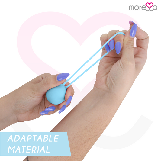 Blue tool held by hands with purple nail polish on a white background, featuring the brand 'morena'.