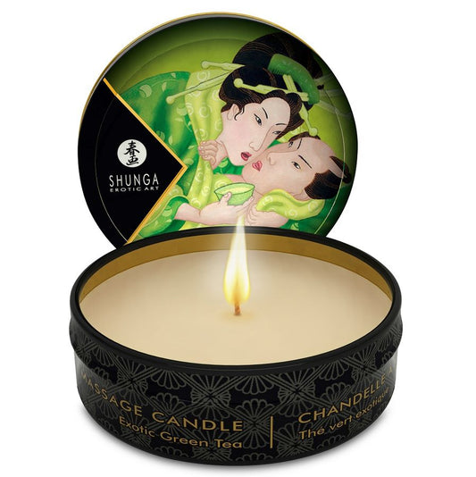 Shunga massage candle with green tea scent in open container on a white background