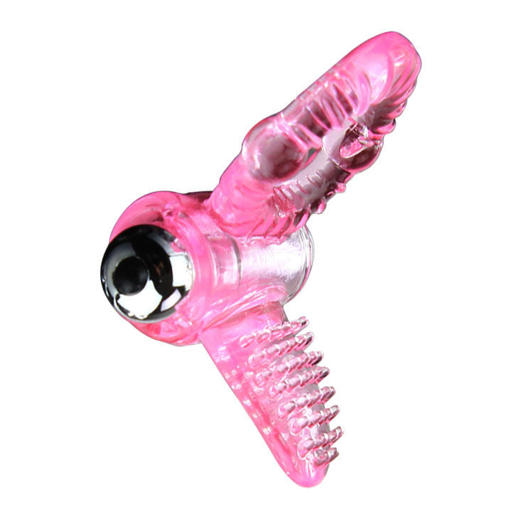 Pink and clear plastic object with a metallic ball on a white background