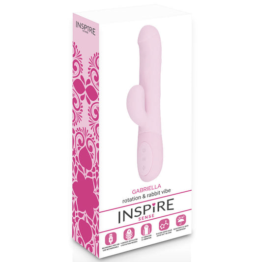Pink 'Inspire' vibrator with packaging on a white background