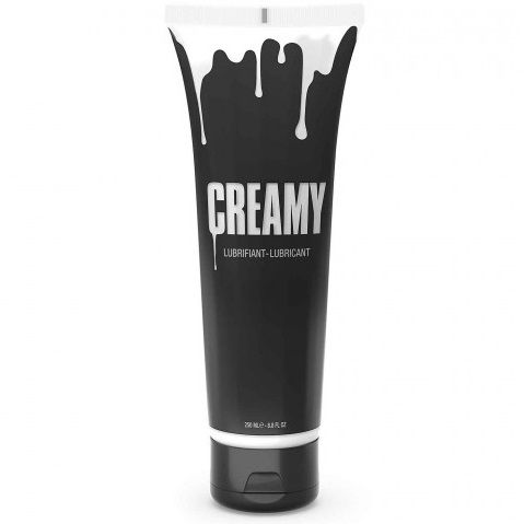 Black tube of 'Creamy' lubricant on a white background