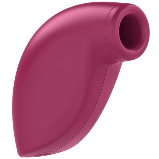 Pink handheld device on a white background