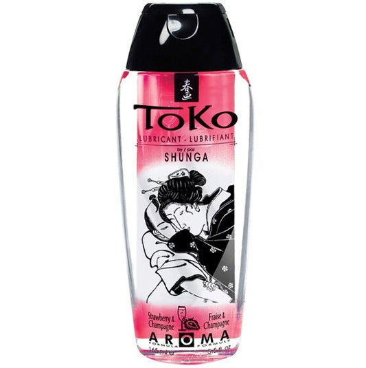 Shunga Toko lubricant bottle with strawberry and champagne aroma on a white background